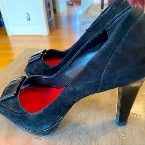 Black high heels. Barely warn.